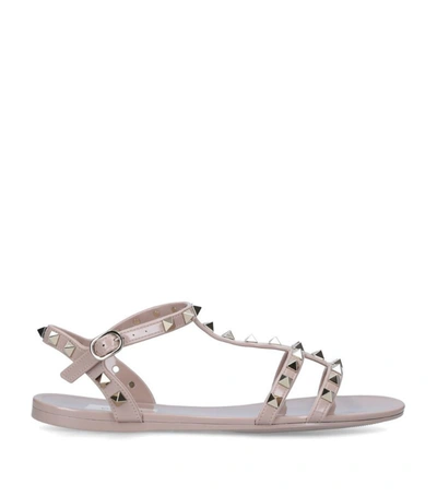 Shop Valentino Rockstud Gladiator Sandals In Nude