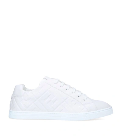 Shop Fendi Logo Embossed Sneakers In White