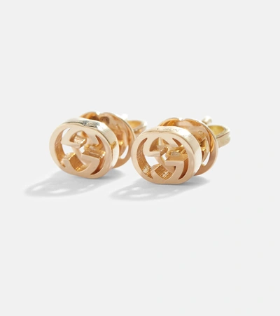 Shop Gucci Interlocking G 18kt Gold Earrings