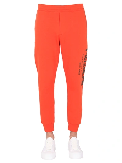Shop Alexander Mcqueen Jogging Pants In Arancione