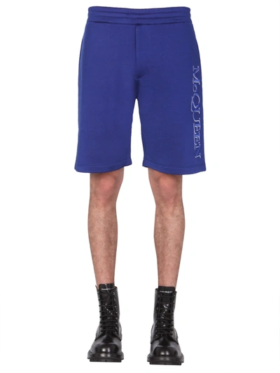 Shop Alexander Mcqueen Shorts With Embroidered Logo In Blu