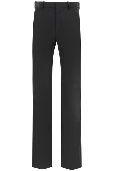 Shop Raf Simons Flared Trousers In Black (black)