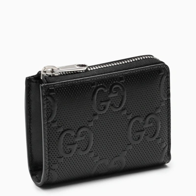 Shop Gucci Black Gg Embossed Coin Holder