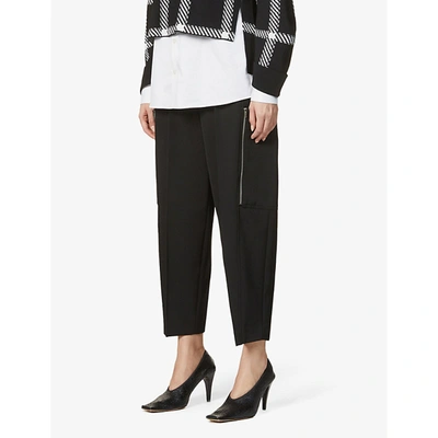 Shop Stella Mccartney Liv Tapered High-rise Wool Trousers In Black