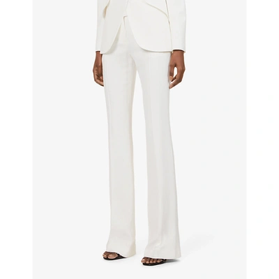 Shop Alexander Mcqueen Flared Mid-rise Crepe Trousers In Light Ivory