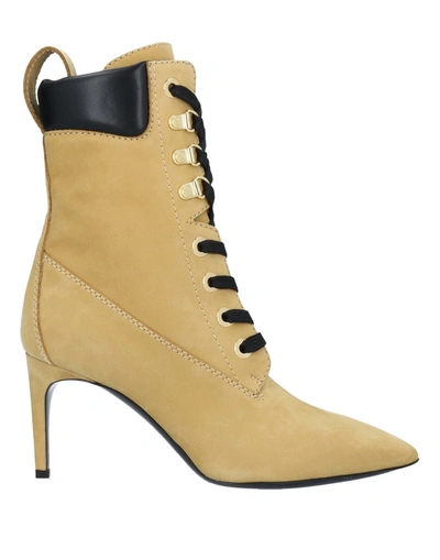 Shop Moschino Ankle Boots In Ocher