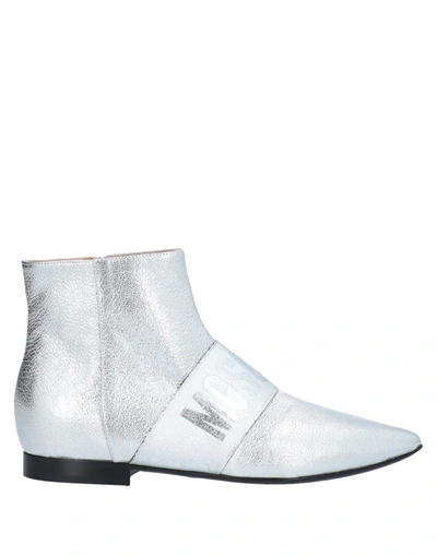 Shop Moschino Ankle Boots In Silver