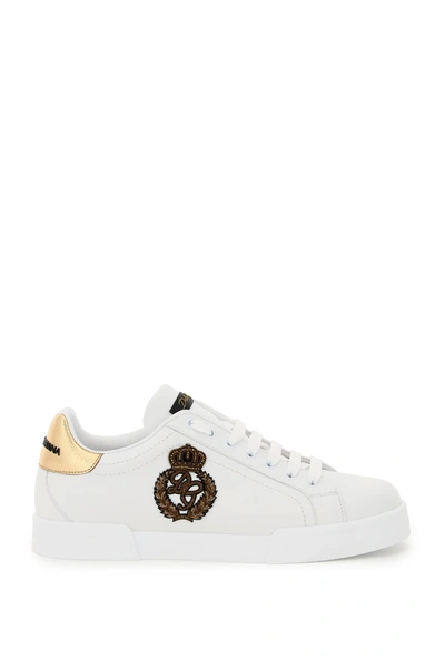 Shop Dolce & Gabbana Portofino Sneakers With Patch In Bianco Oro Scuro (white)