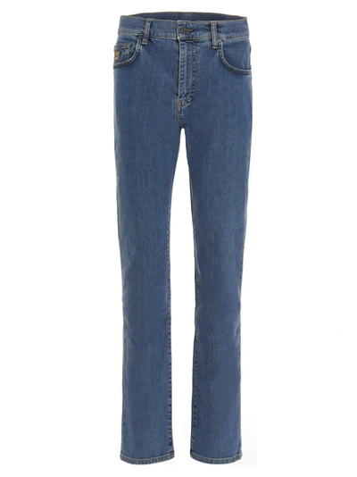 Shop Moschino Teddy Patched Slim In Blue