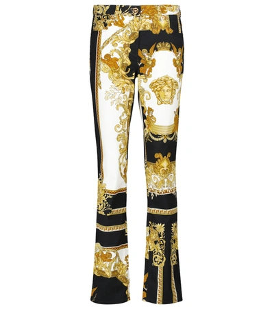 Shop Versace Barocco Flared Jeans In Gold