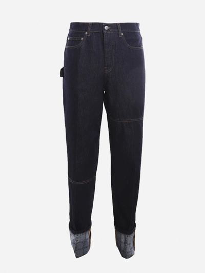 Shop Jw Anderson Cotton Denim Jeans With Cuffs On The Bottom In Blue