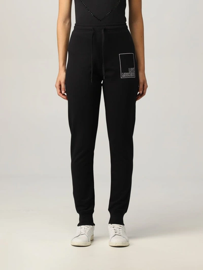 Shop Love Moschino Pants  Jogging Pants With Stitched Logo In Black