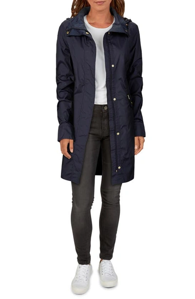 Shop Cole Haan Signature Back Bow Packable Hooded Raincoat In Indigo