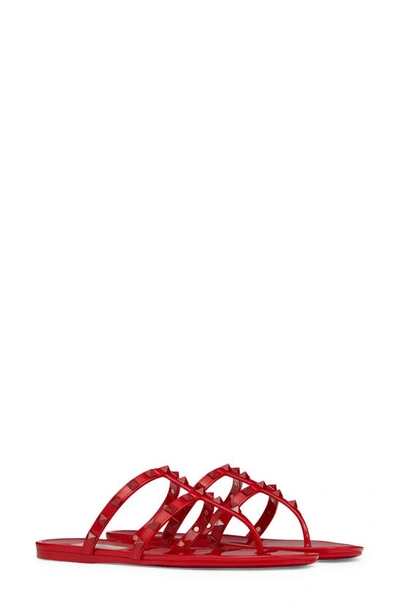 Shop Valentino Rockstud Jelly Sandal In Rosso