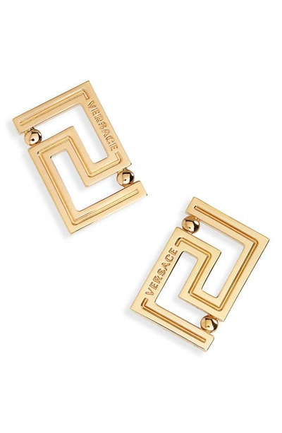 Shop Versace Greca Stud Earrings In  Gold