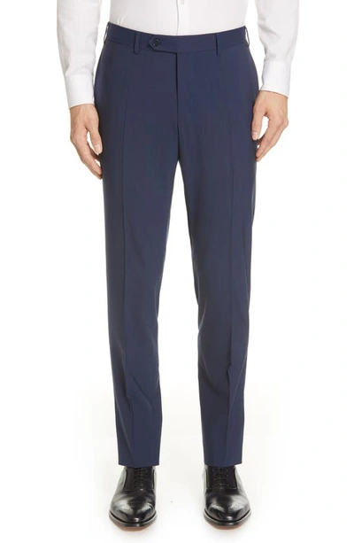 Shop Canali Flat Front Solid Stretch Wool Trousers In Navy