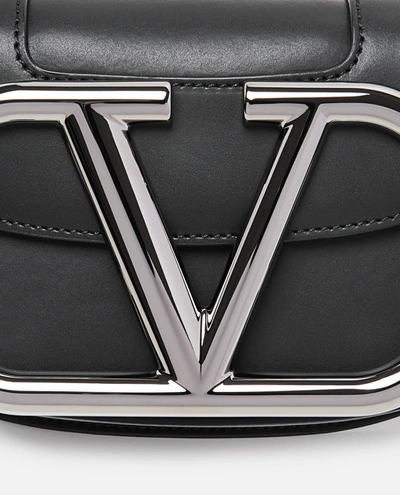 Shop Valentino Garavani Vltn  Leather Waist Satchel In Black
