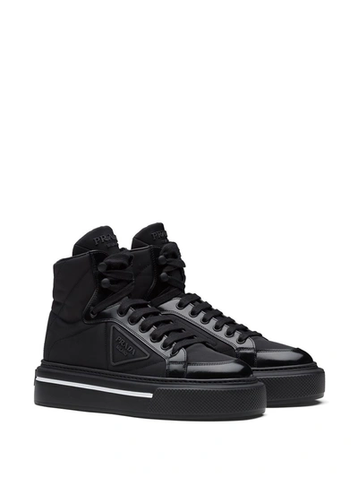 Shop Prada Re-nylon And Leather Sneakers In Black