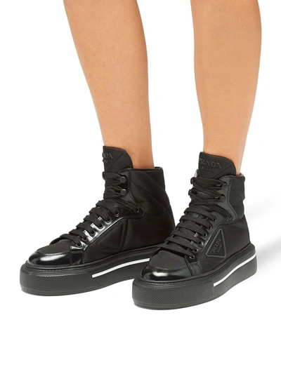 Shop Prada Re-nylon And Leather Sneakers In Black