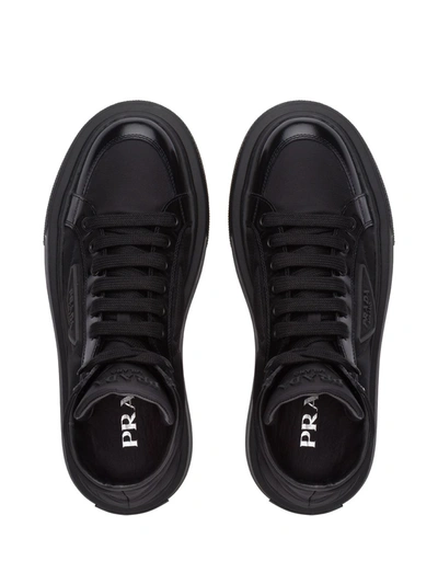 Shop Prada Re-nylon And Leather Sneakers In Black