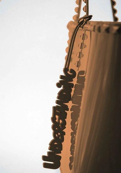 Carmen Sol Understanding Charm In Brown