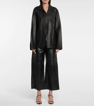 Shop Totême Leather Wide-leg Pants In Black