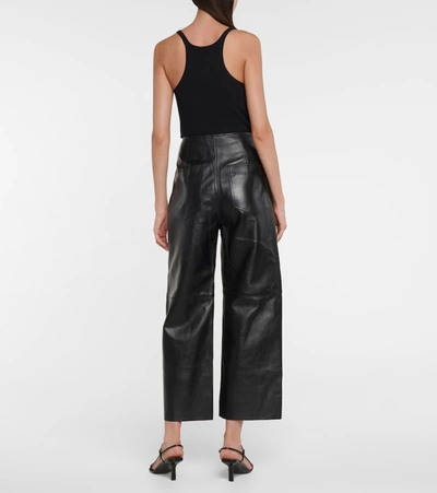 Shop Totême Leather Wide-leg Pants In Black