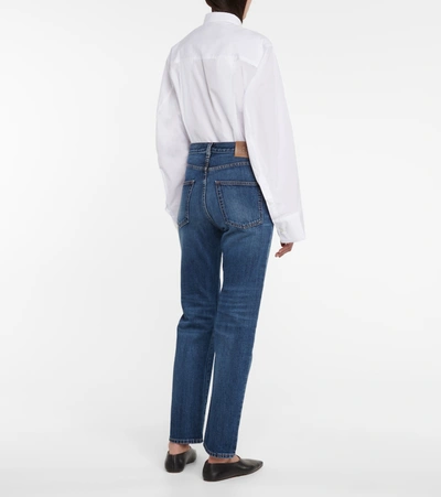 Shop Totême High-rise Slim-straight Jeans In Blue