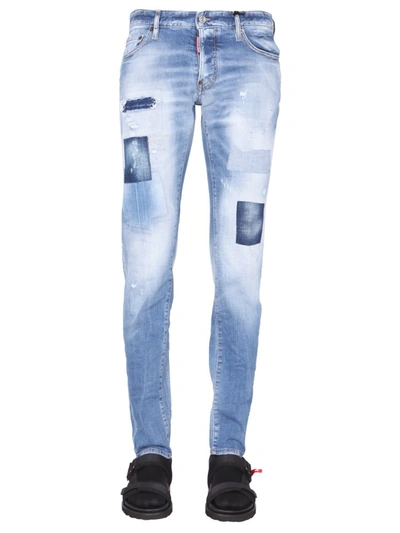 Shop Dsquared2 Distressed Bootcut Jeans In Blue