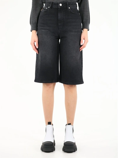 Shop Ganni High Rise Denim Bermuda Shorts In Black