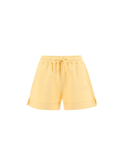 Shop Ganni Software Drawstring Shorts In Yellow