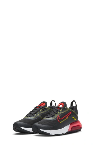Shop Nike Kids' Air Max 2090 Sneaker In Smoke Grey/ Bright Crimson