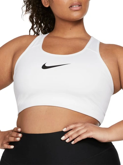 Shop Nike Plus Size Medium Impact Sports Bra In White