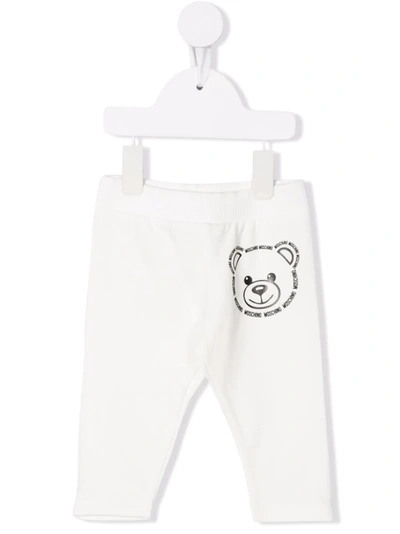 Shop Moschino Logo Tracksuit Bottoms In White