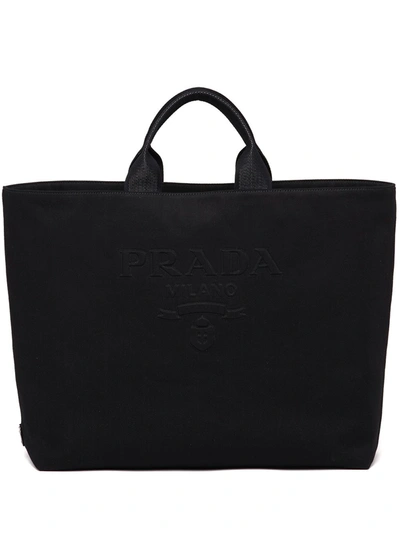 Shop Prada Drill Embossed-logo Tote Bag In Schwarz