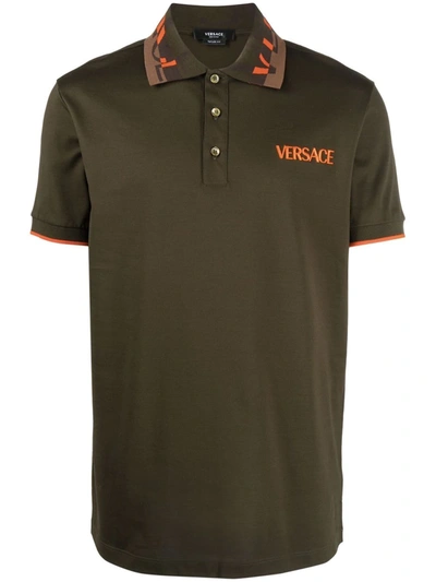 Shop Versace Logo-embroidered Polo Shirt In Grün