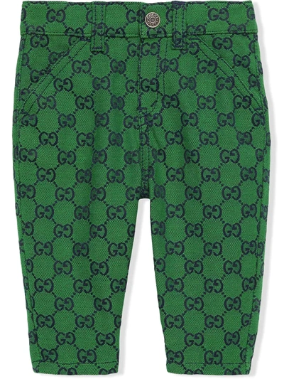 Shop Gucci Gg Canvas Jeans In Green