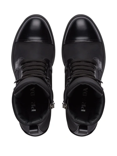 Shop Prada Logo Plaque Ankle Boots In Nero
