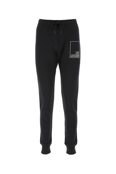Shop Love Moschino Logo Drawstring Track Pants In Black
