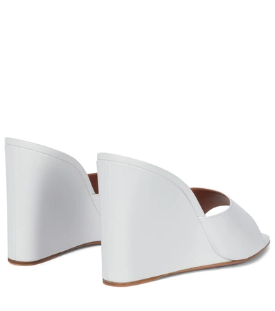 Shop Amina Muaddi Lupita Leather Wedge Sandals In White