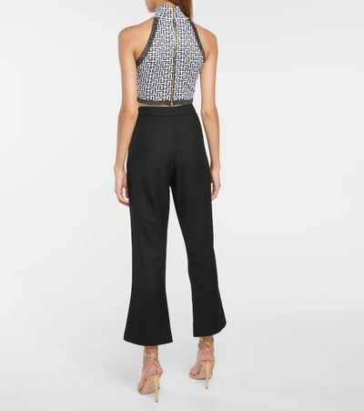 Shop Balmain High-rise Flared Wool Pants In Black