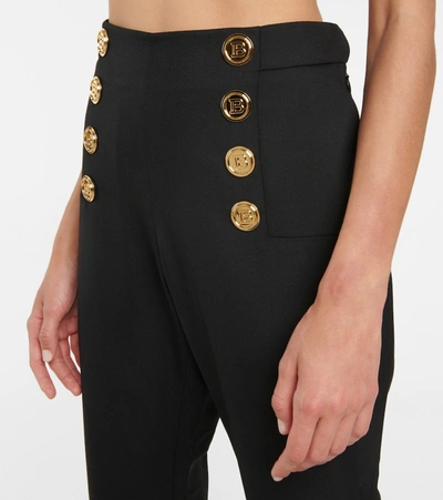 Shop Balmain High-rise Flared Wool Pants In Black