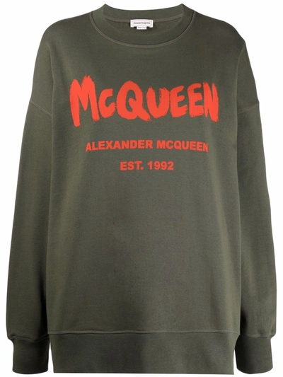 Shop Alexander Mcqueen Logo-print Crew-neck Sweatshirt In Grün