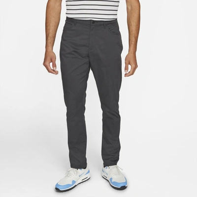 Shop Nike Flex Men's Slim Fit 5-pocket Golf Pants In Dark Smoke Grey,wolf Grey