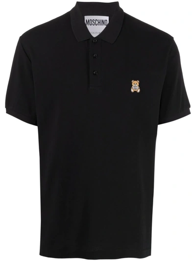 Shop Moschino Logo Embroidered Polo Shirt In Schwarz