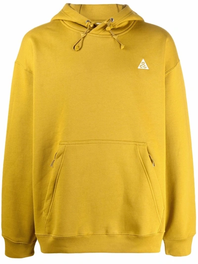 Shop Nike Logo-detail Pullover Hoodie In Gelb