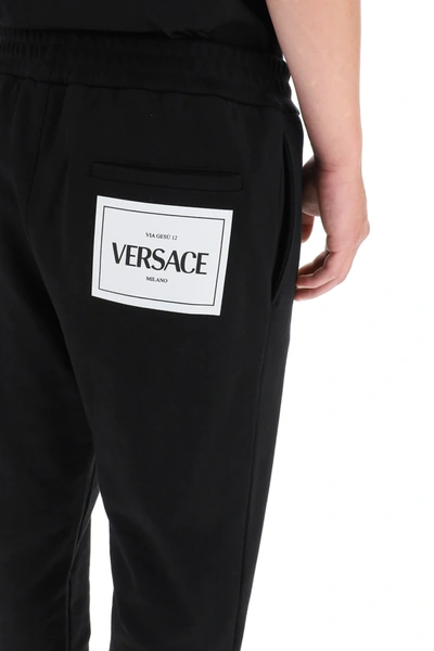 Shop Versace Sweatpants With Logo In Black,white