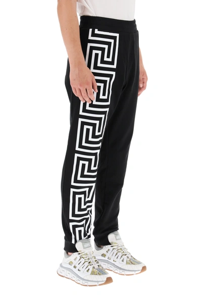 Shop Versace Greek Print Sweatpants In Black