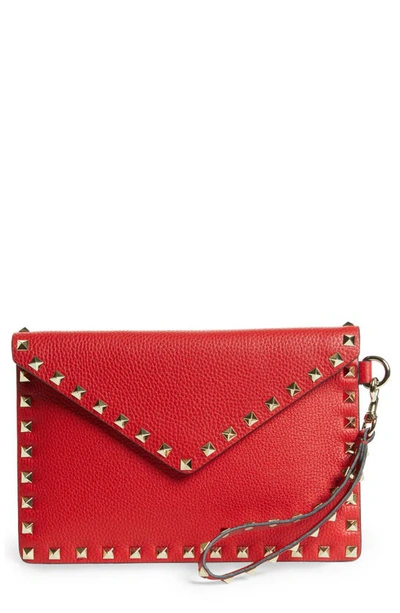 Shop Valentino Medium Rockstud Leather Envelope Pouch In Rouge