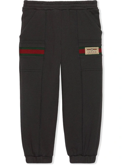 Shop Gucci Label Track Pants In Grey
